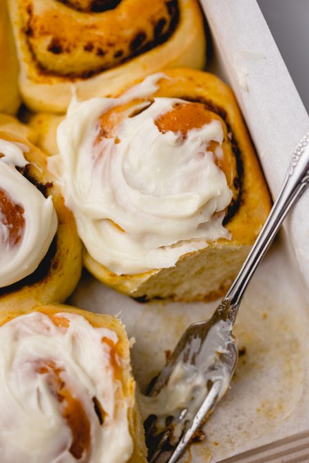 Pumpkin rolls with white chocolate cream cheese frosting